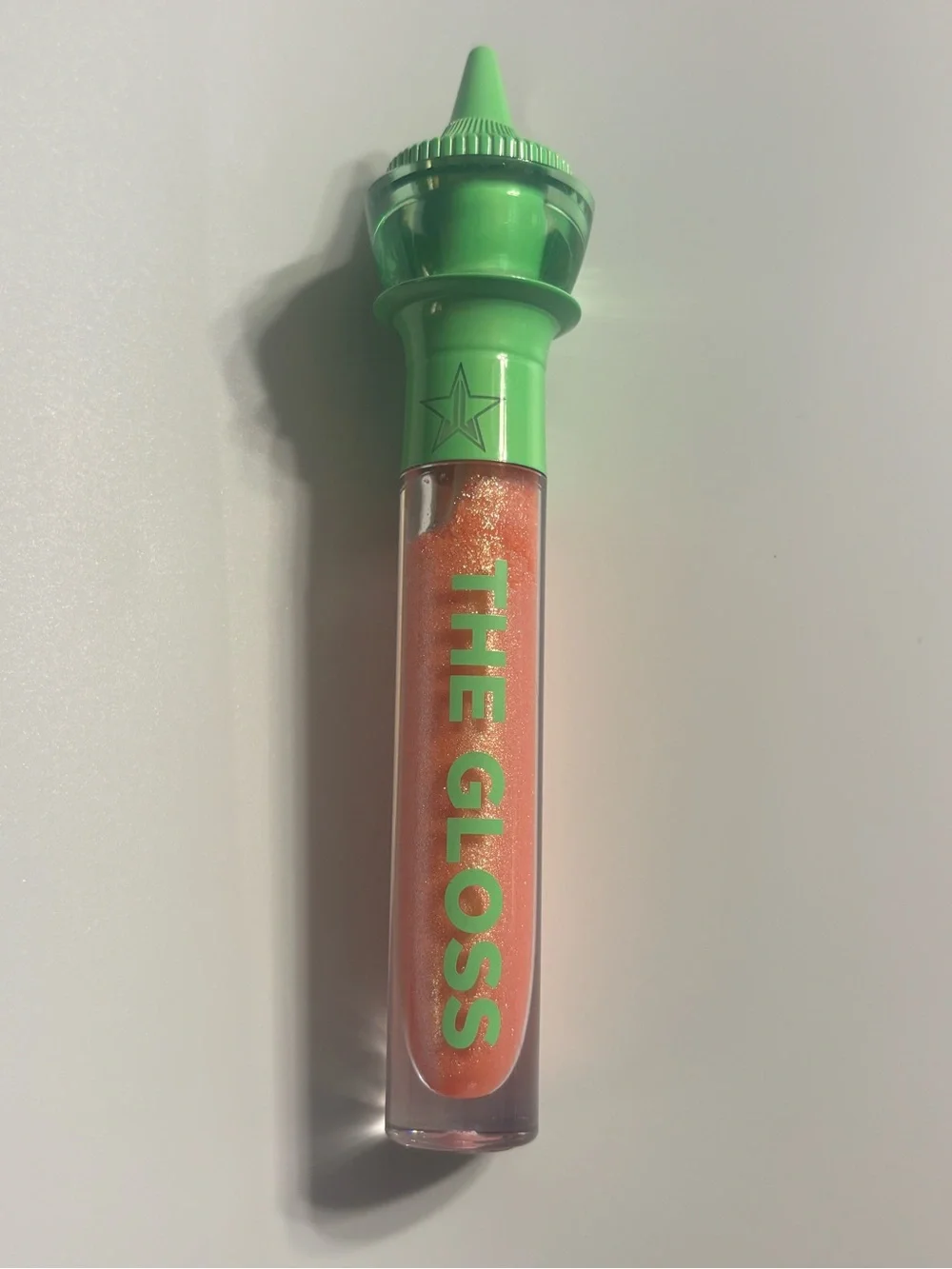 Jeffree Star The Gloss Peach Price Tag Lip Gloss in Shimmery